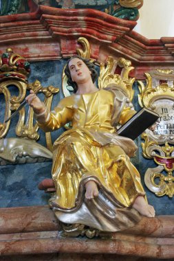 Evangelist Aziz John, Hırvatistan 'ın Cucerje kentindeki Bakire Meryem Kilisesi' nin kürsüsündeki heykel.
