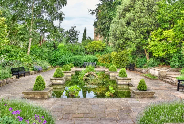 Idyllic garden with pond Royalty Free Stock Images