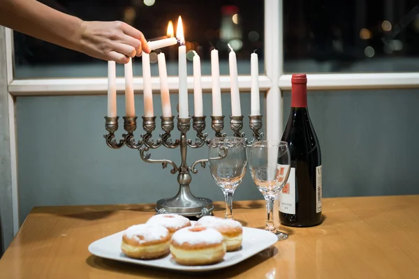 Lighting of candles for Hanukkah holiday. — Stock Photo, Image