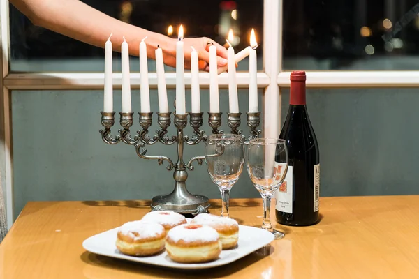 Lighting of candles for Hanukkah holiday. — Stock Photo, Image