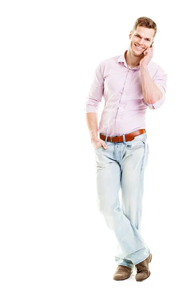 Young man talking on the phone - full length shot isolated — Stock Photo, Image