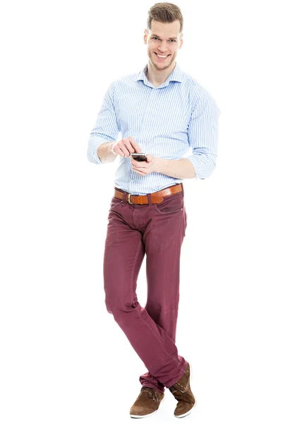 Fiatal üzletember textil elszigetelt fehér háttérben mobiltelefon Stock Fotó