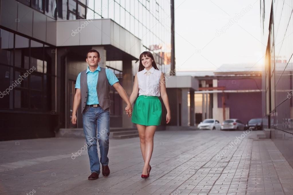 happy young couple in city 