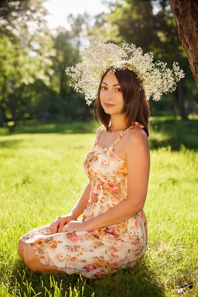 Portrait of a young pretty woman in a wreath — Stock Photo, Image