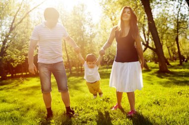 happy family having funin the park