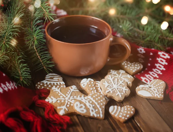 Cup of tea with Christmas sweetness — Stock Photo, Image