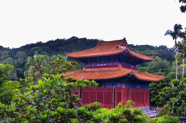 SANYA, HAINAN, CHINA - OCTOBER 10: A colorful wooden Chenglu pavilion of traditional Chinese architecture in the Sanya Nanshan Cultural Center at October 10, 2019 in Sanya, Hainan, China