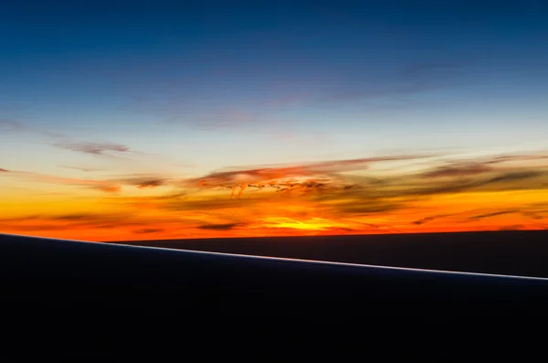 Pôr do sol vista do avião — Fotografia de Stock