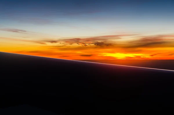 Pôr do sol vista do avião — Fotografia de Stock