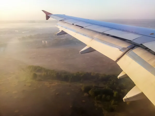 Pôr do sol vista do avião — Fotografia de Stock