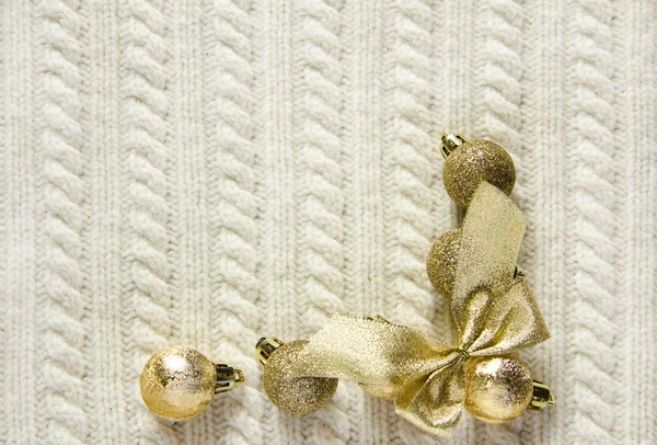 Textura de lana tejida con decoración navideña, bastón de caramelo o taza de té —  Fotos de Stock