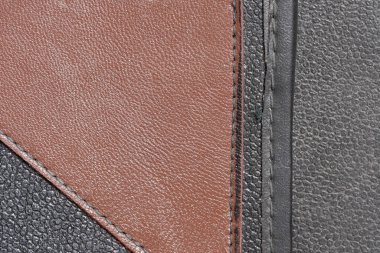 Eski püskü, yırtık pırtık bir el çantasından alınmış deri arka plan. Kapalı çekim makro fotoğraf makinesi.