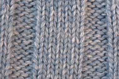 Tekstil desenli arka plan yakın çekim makro fotoğraf büyük makine örgü erkek yünlü süveter parçası