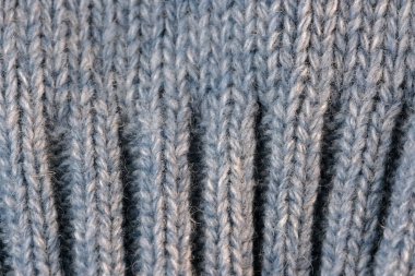 Tekstil desenli arka plan yakın çekim makro fotoğraf büyük makine örgü erkek yünlü süveter parçası