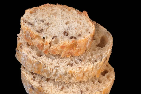 Snijd Volkoren Stokbrood Zwarte Achtergrond Close Macro Fotografie — Stockfoto