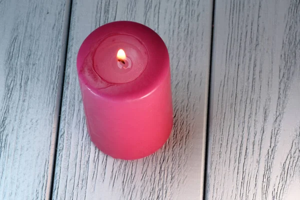 Red Candle Burning White Wooden Background Close — Stock Photo, Image