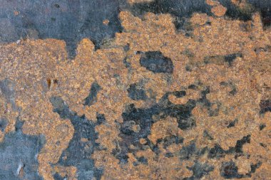 Eski paslı demir yakın çekim makro fotoğrafçılığından renkli bir arka plan.