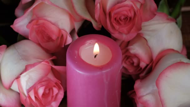 Video Clip Red Paraffin Candle Burning Next Lying Roses Close — Stock Video