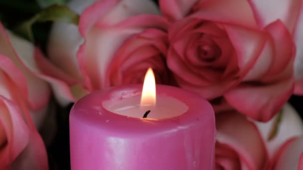 Video Clip Red Paraffin Candle Burning Next Lying Roses Close — Wideo stockowe