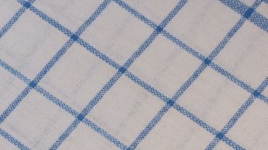 Tekstil video arkaplanı yavaşça ışık peçetesini yakın çekimde döndürür