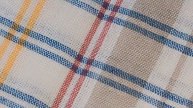 Tekstil video arkaplanı yavaşça ışık peçetesini yakın çekimde döndürür