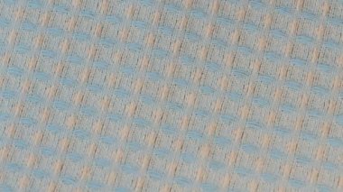 Tekstil video arkaplanı yavaşça ışık peçetesini yakın çekimde döndürür