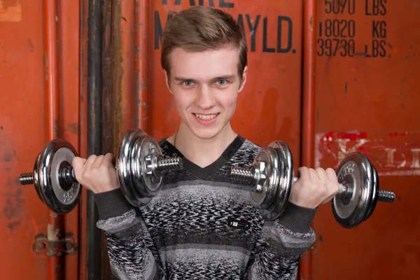 Portrait of young men with dumbbells — Stock Photo, Image