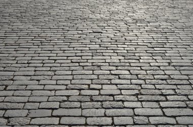 Old cobblestone pavement. clipart