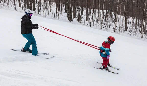 Mother Teaching Daughter to Ski at Mont-Tremblant Ski Resort Stock Image