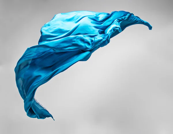 Abstract teal fabric in motion — Stock Photo, Image