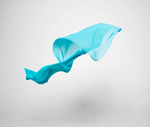 Abstract teal fabric in motion — Stock Photo, Image