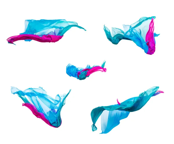 Sada různobarevných tkaniny v pohybu — Stock fotografie