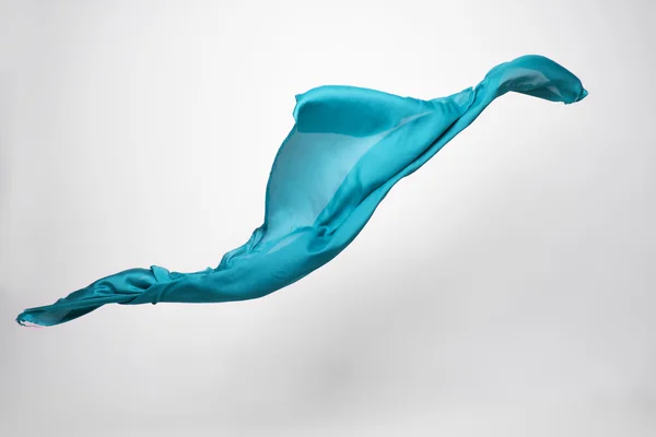 Abstract teal fabric in motion — Stock Photo, Image