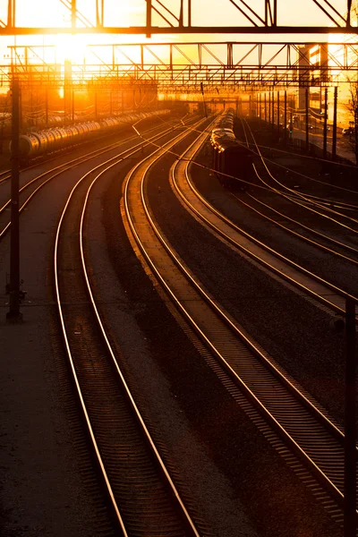 Railroad station at sunset — Stock Photo, Image