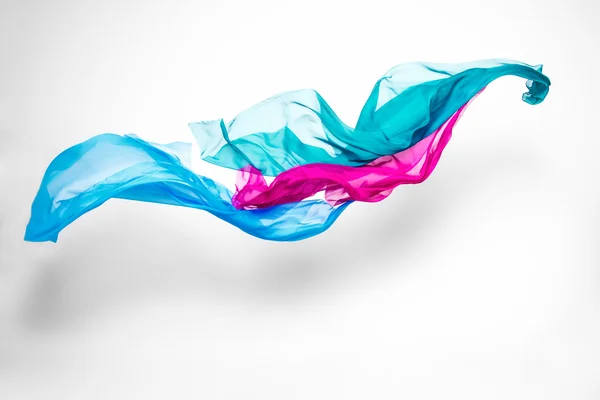 Абстрактная разноцветная ткань в движении — стоковое фото
