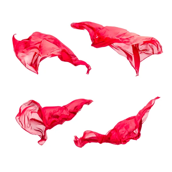 Set of red fabric pieces flying — Stock Photo, Image