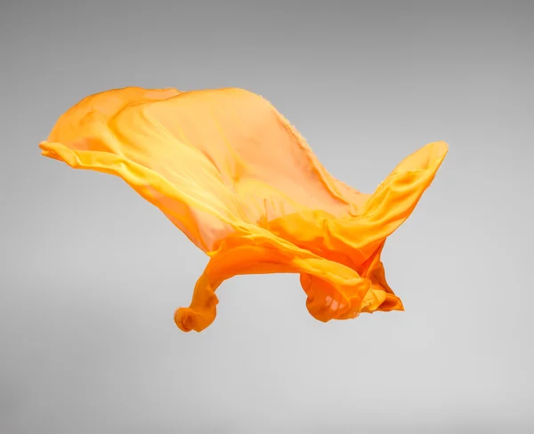 Yellow flying fabric — Stock Photo, Image
