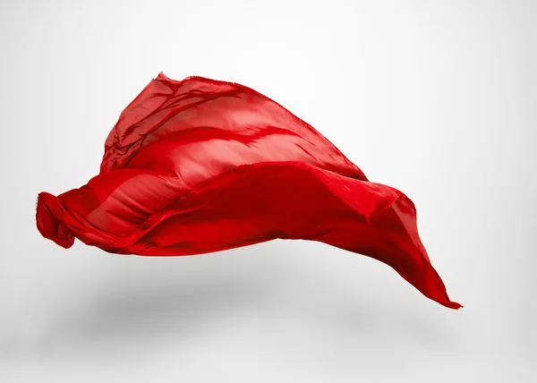 Kırmızı uçan kumaş — Stok fotoğraf