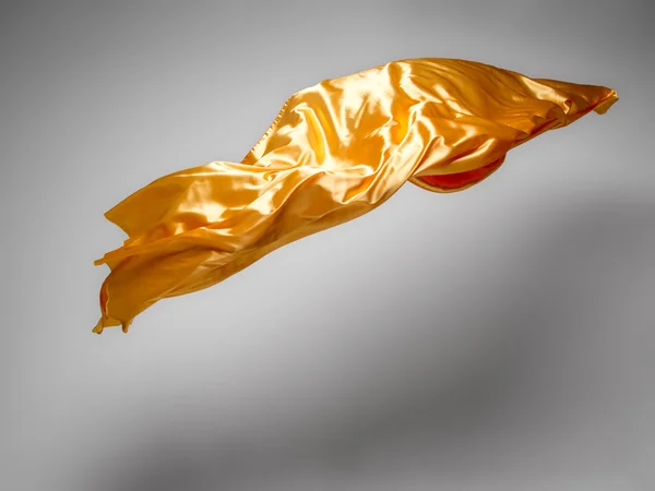 Altın uçan kumaş — Stok fotoğraf