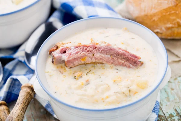 Cheese soup with smoked ribs — Stock Photo, Image