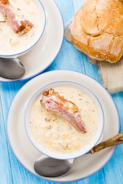 Cheese soup with smoked ribs — Stock Photo, Image