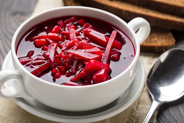 Bowl of red beetroot soup — Stock Photo, Image
