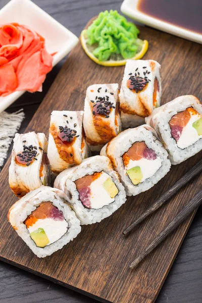 Sushi roll with salmon, tuna and eel — Stock Photo, Image