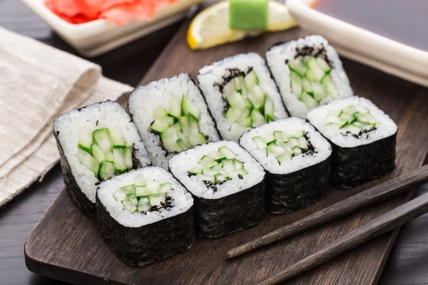 Sushi rolls with cucumber and sesame seed — Stock Photo, Image