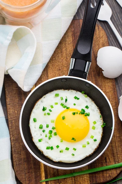 Fried egg in a small pan — Stock Photo, Image