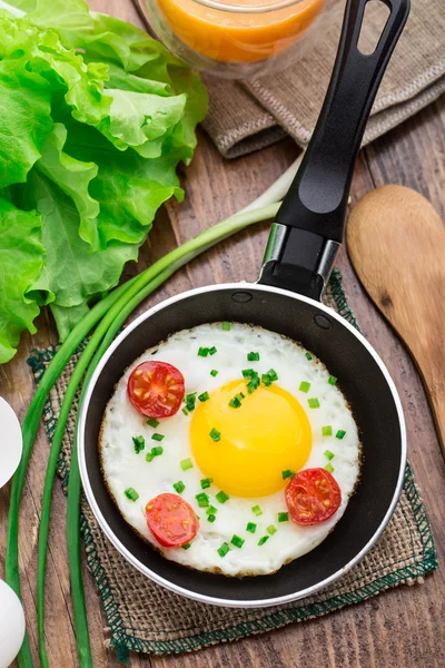 Fried egg in a small pan — Stock Photo, Image