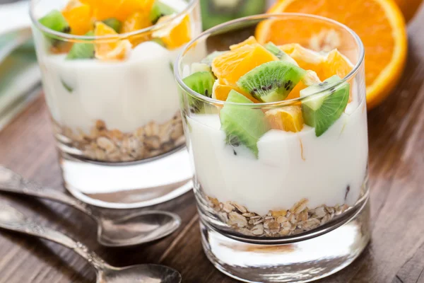 Yogurt with muesli and fruits — Stock Photo, Image