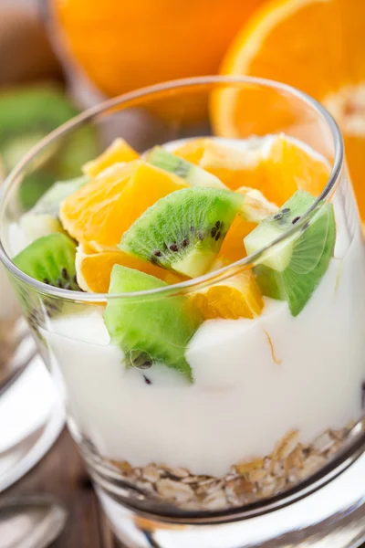 Yogurt with muesli and fruits — Stock Photo, Image