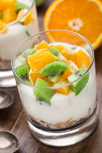 Yogurt with muesli and fruits — Stock Photo, Image