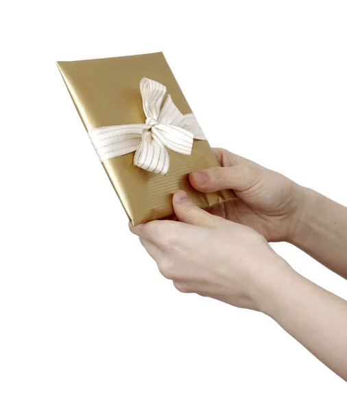 Young woman holding a present — Stock Photo, Image